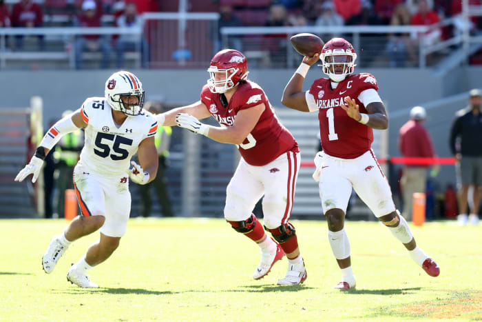 Oct 16, 2021; Fayetteville, Arkansas, USA; Auburn Tigers edge Eku Leota (55) pressures as Arkansas Razorbacks offensive lineman Cole Carson (50) blocks for quarterback KJ Jefferson (1) during the fourth quarter at Donald W. Reynolds Razorback Stadium. Auburn won 38-23. Mandatory Credit: Nelson Chenault-USA TODAY Sports